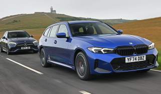 BMW 330e vs Mercedes C 300 e twin test - front angled