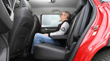 Auto Express senior test editor Dean Gibson sitting in the Skoda Kodiaq's middle row seats